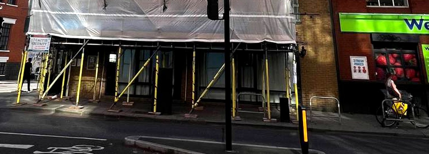 Pavement Gantry, Tower Bridge Road, London | Armstrong Scaffolding Armstrong Scaffolding pavement gantry on yellow standards keeping the footpath open on Tower Bridge Road, London